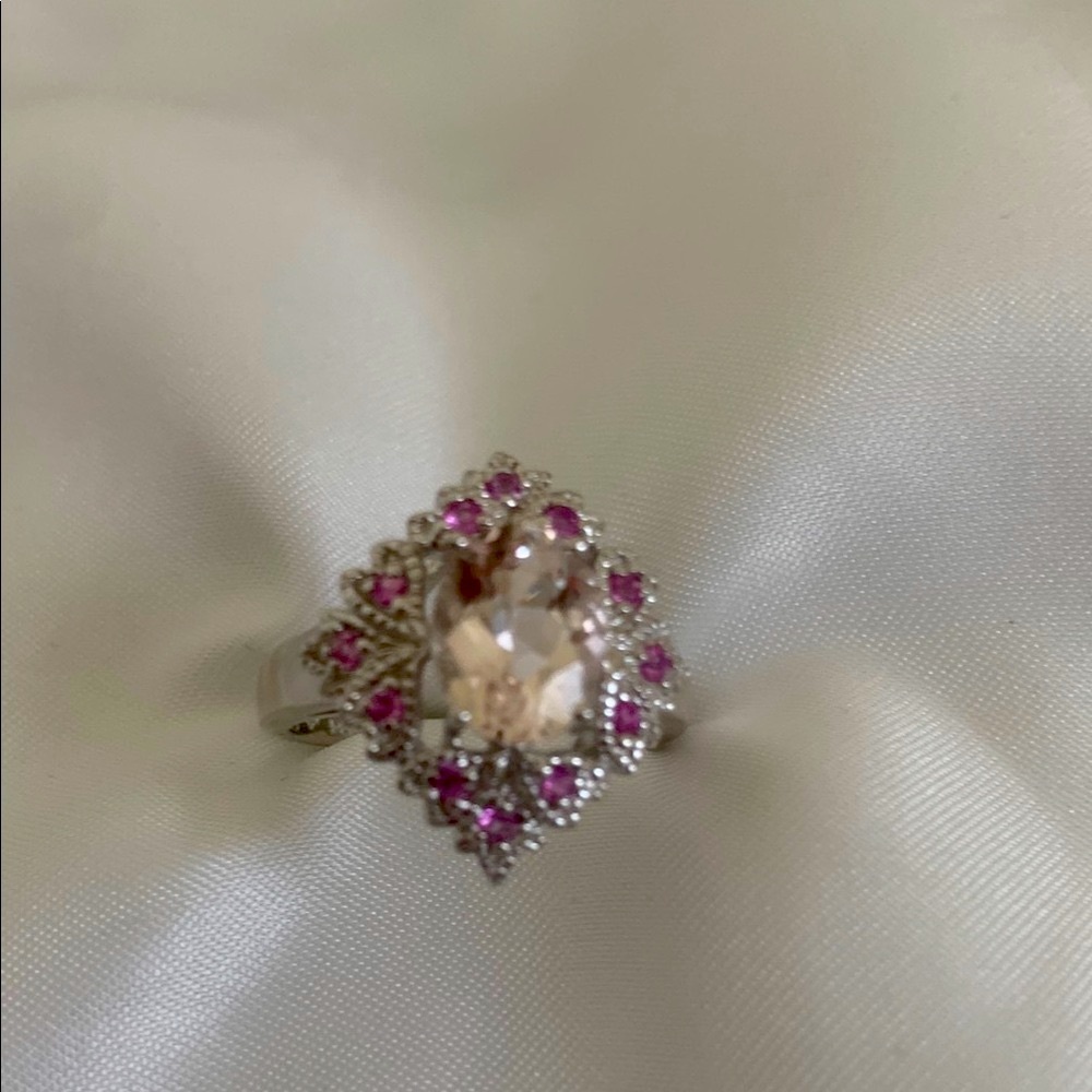 Elegant Silver and Pink Ring with Intricate Detailing